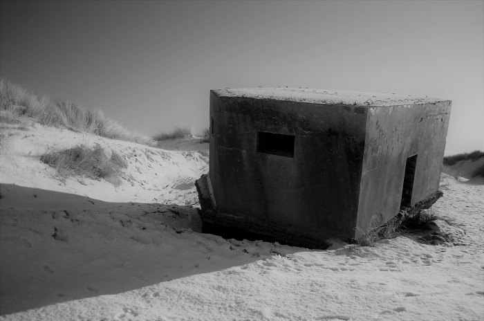 Old world war II bunker in the snow at Balmedie beach